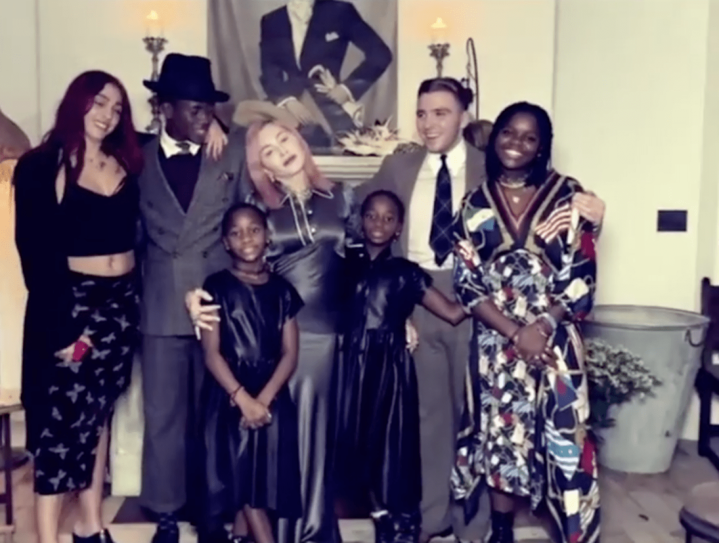 Madonna posing with all six children